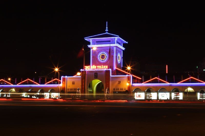 Ben Thanh Night Market at night with neon lights is a popular nightlife attraction in HCMC