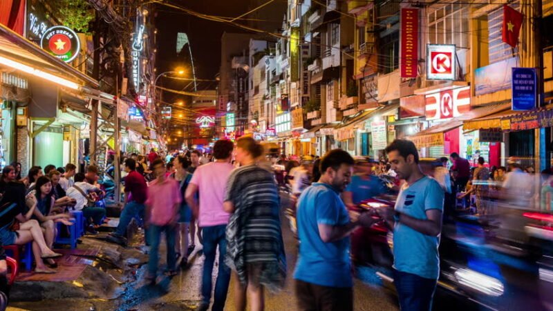 Pham Ngu Lao street full of young people enjoying nightlife in the centre of Ho Chi Minh City