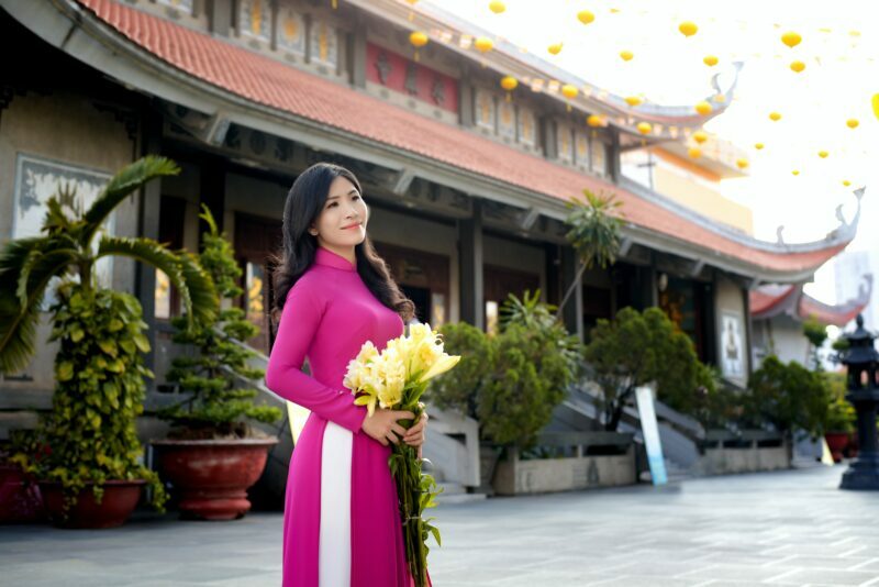 Sexy vietnamese girl wearing purple ao dai